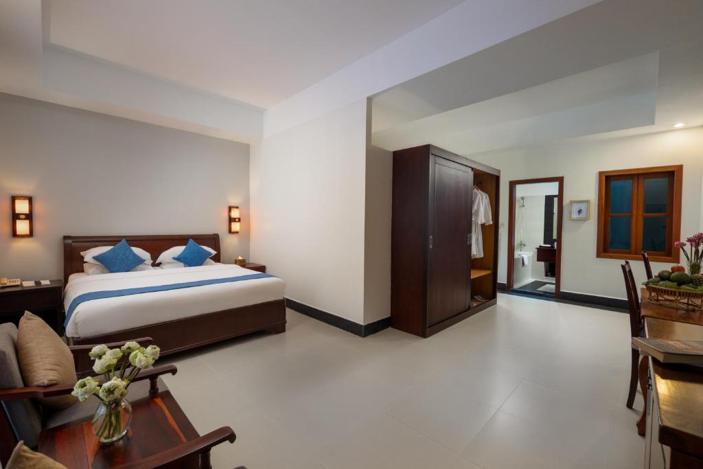 Postel nebo postele na pokoji v ubytování Skyline Boutique Hotel
