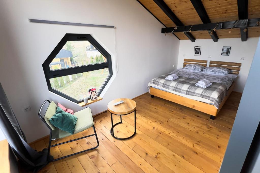 Postel nebo postele na pokoji v ubytování HUUT