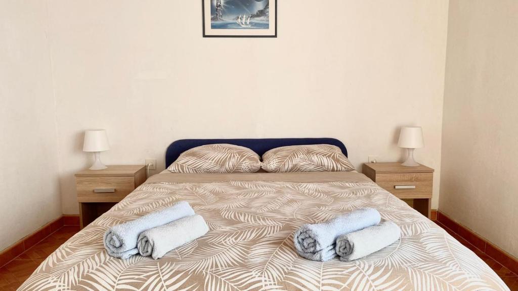 Postel nebo postele na pokoji v ubytování Ždrelac Guest House