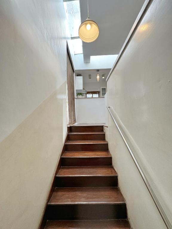 a staircase in a building with a light at Ananya Apartments Phase 1 in Kathmandu