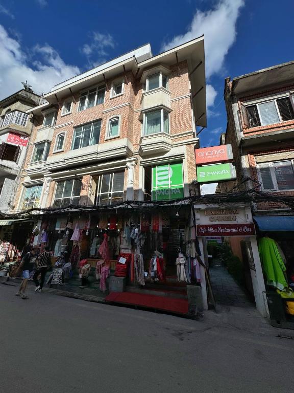 a building with a clothing store in front of it at Ananya Apartments Phase 1 in Kathmandu