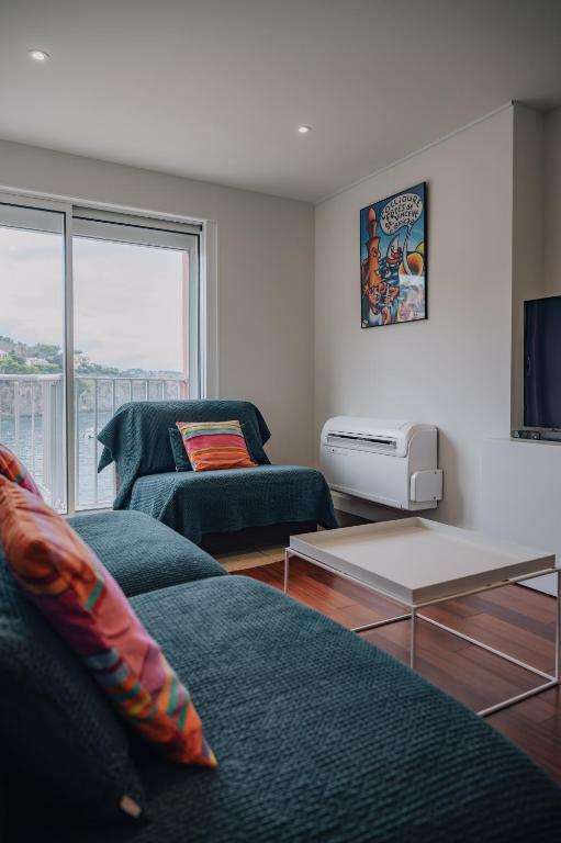 Posedenie v ubytovaní Splendide appartement climatisé avec vue sur mer et clocher - Parking et WIFI