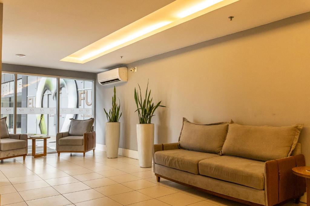 Posezení v ubytování Flat Fusion Itaguaí - Conforto e Conveniência em Frente à Rodoviária, na linda Costa Verde - Sua Estadia Perfeita!
