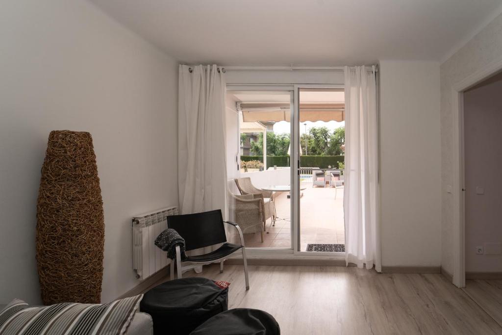 Televízia a/alebo spoločenská miestnosť v ubytovaní Cambrils Puerto