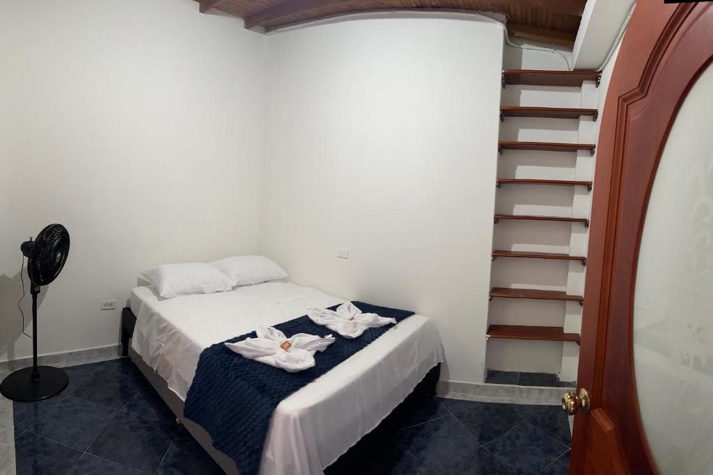 Postel nebo postele na pokoji v ubytování Casa grande parque central