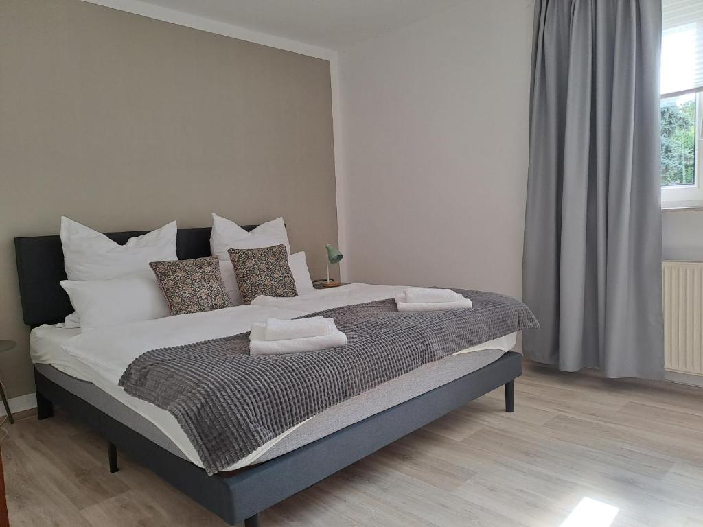Postel nebo postele na pokoji v ubytování Apartment Seeblick