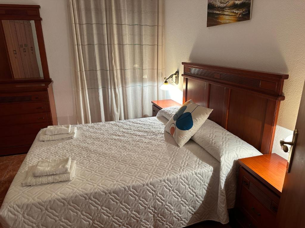 Posteľ alebo postele v izbe v ubytovaní Apartamentos & Rooms JP