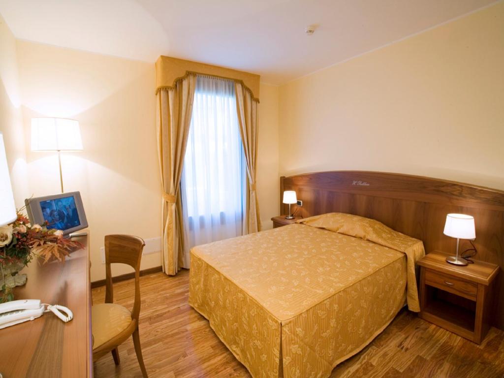 Postel nebo postele na pokoji v ubytování Hotel Purlilium