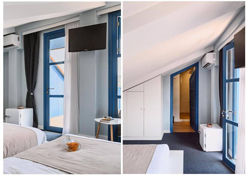 Postel nebo postele na pokoji v ubytování Blue Balcony Hotel