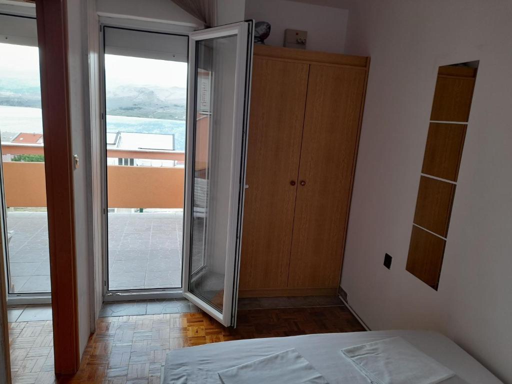 Łóżko lub łóżka w pokoju w obiekcie Apartments Clair