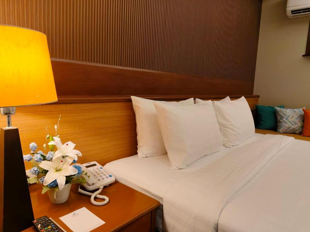 Postel nebo postele na pokoji v ubytování Baan Duangkaew Resort