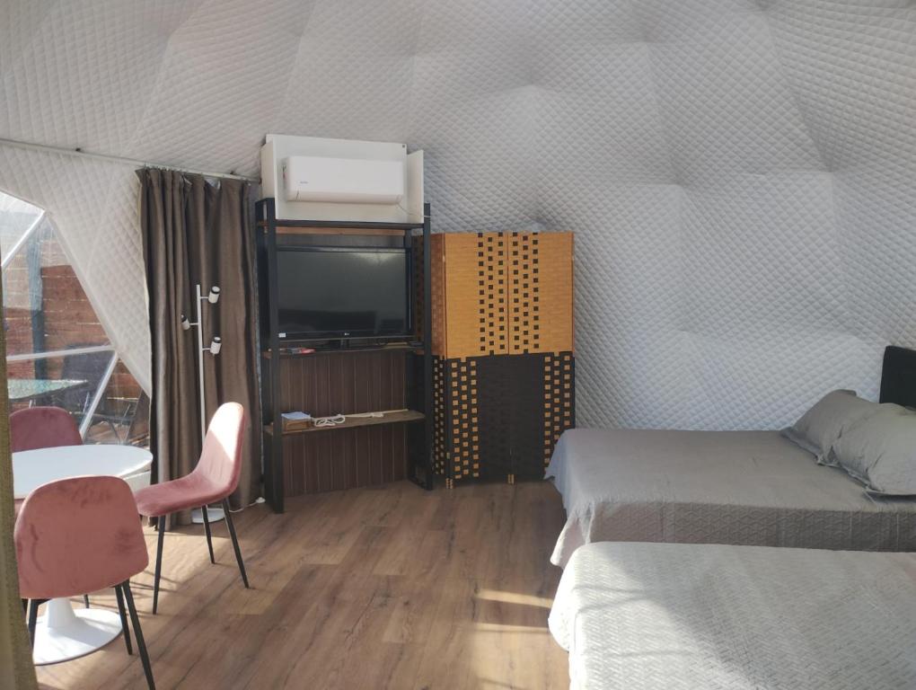 Posezení v ubytování Glamping Domos Lago Rapel