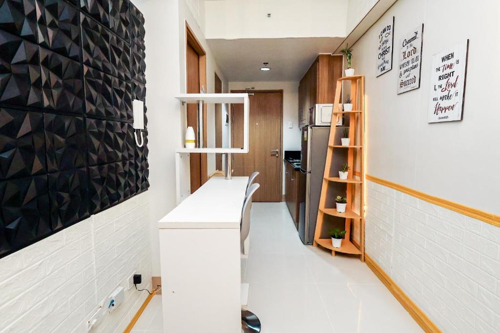 Galería fotográfica de Sapphira Manor Luxurious Condo by the Bay en Manila