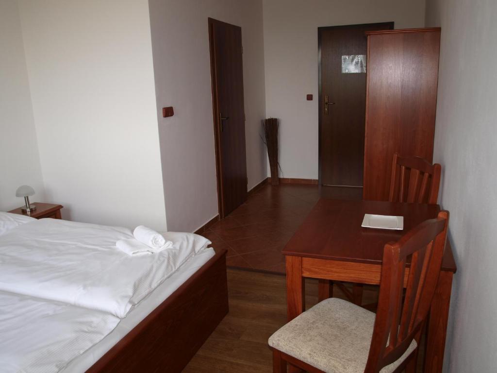 Postel nebo postele na pokoji v ubytování Penzion Mušlov