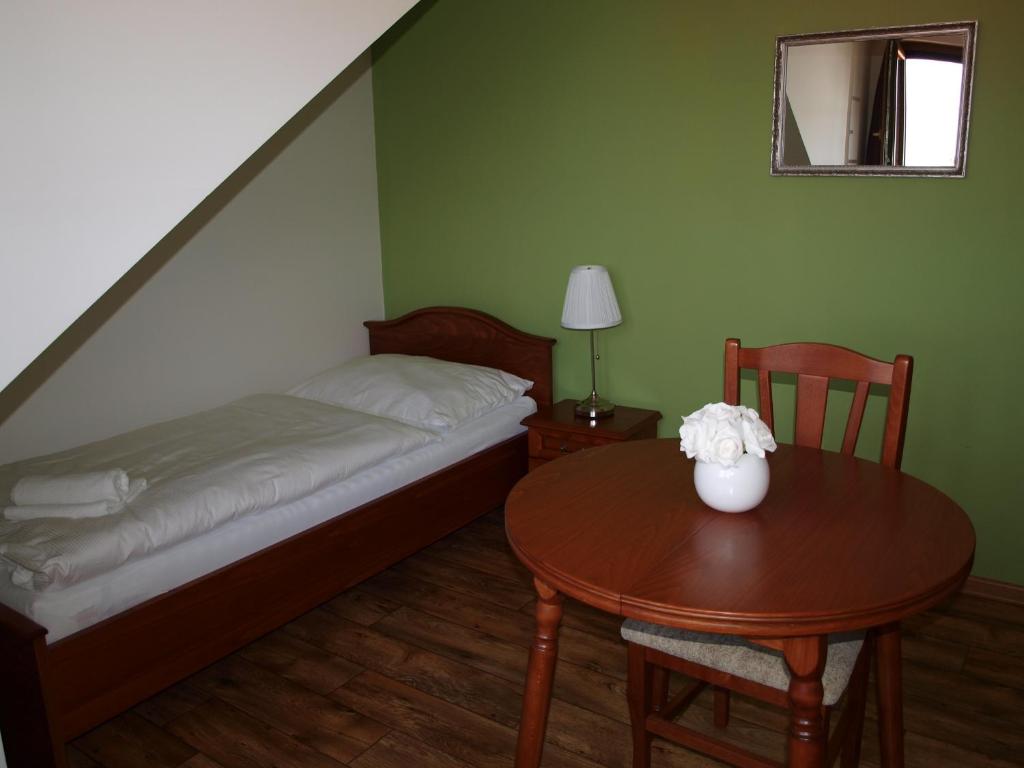 Postel nebo postele na pokoji v ubytování Penzion Mušlov