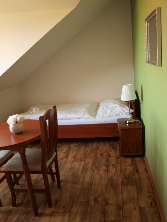 Postel nebo postele na pokoji v ubytování Penzion Mušlov