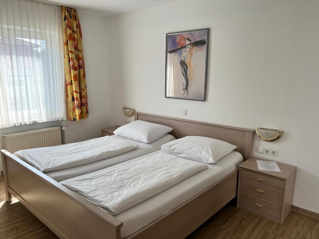 Postel nebo postele na pokoji v ubytování Hotel Fantasie