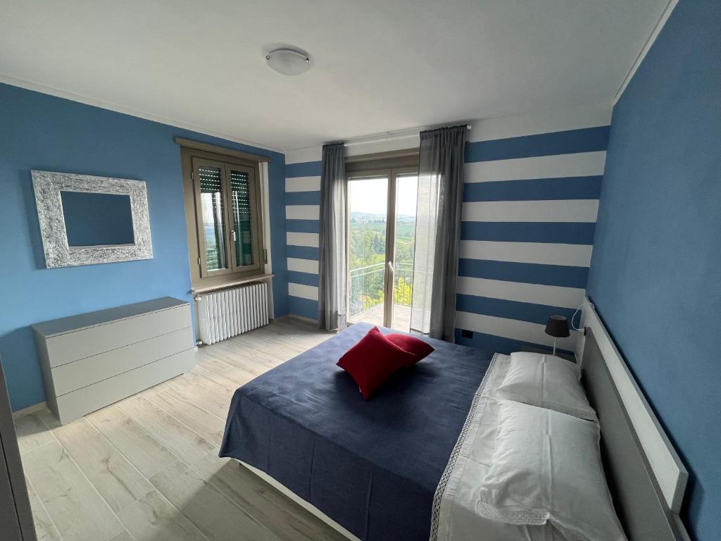 Postel nebo postele na pokoji v ubytování Appartamento panoramico in collina