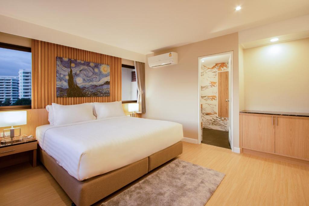 Postel nebo postele na pokoji v ubytování Anantara Hua Hin Resort