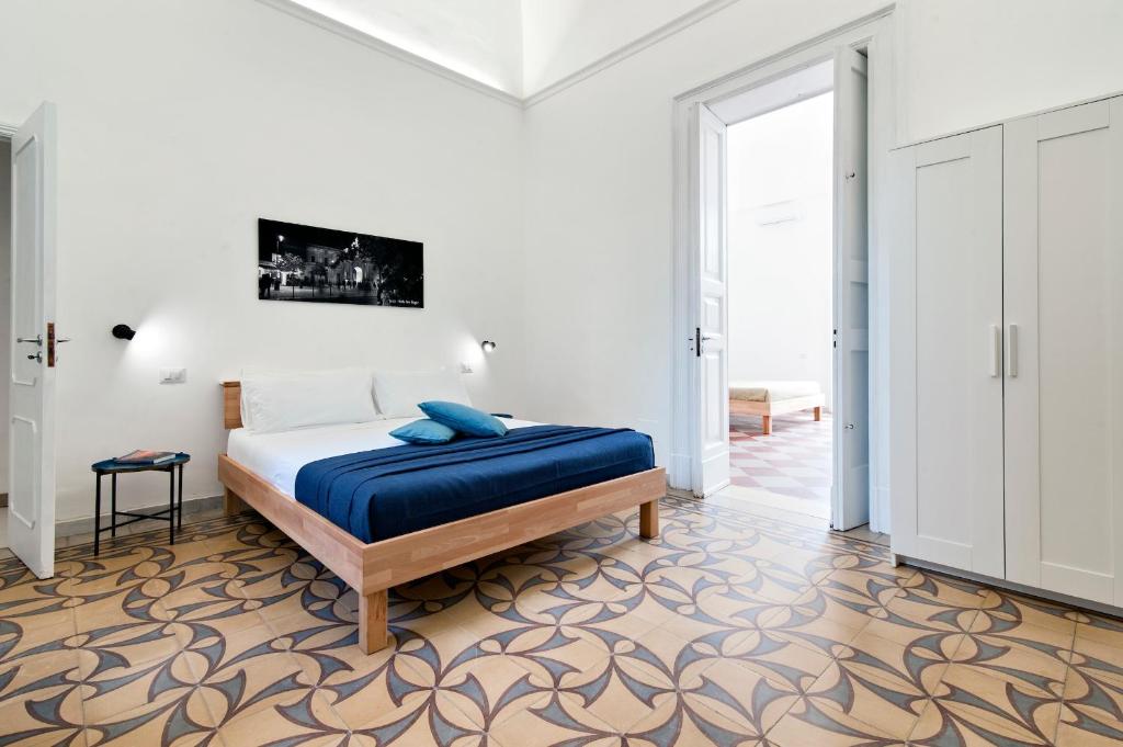 Postel nebo postele na pokoji v ubytování Liberty Rooms