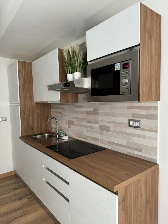 Kuchyň nebo kuchyňský kout v ubytování Monica's home