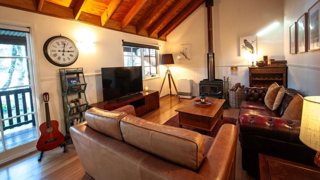 TV a/nebo společenská místnost v ubytování Mountain Den