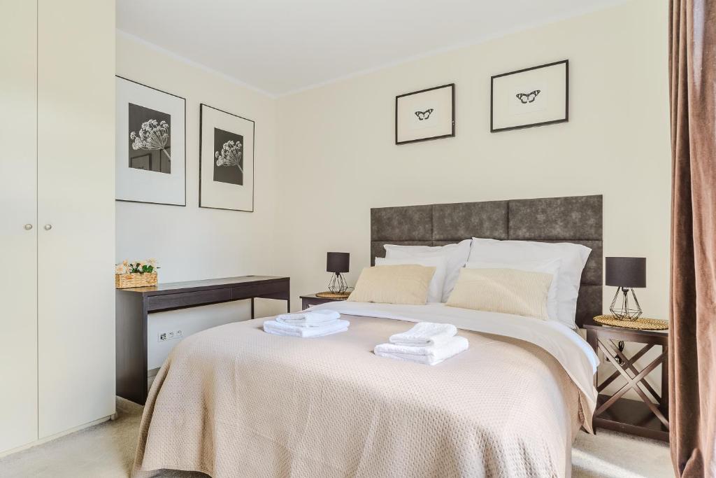 Posteľ alebo postele v izbe v ubytovaní Zygmunta Slominskiego 5 - P&O Apartments