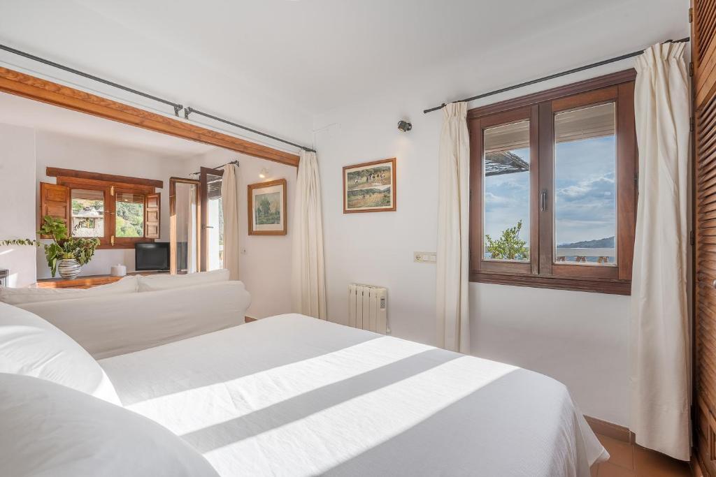 Postel nebo postele na pokoji v ubytování Casa Belmonte