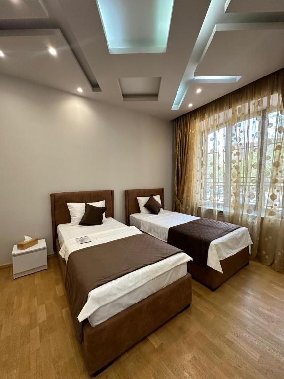 Postel nebo postele na pokoji v ubytování Ser In Hotel
