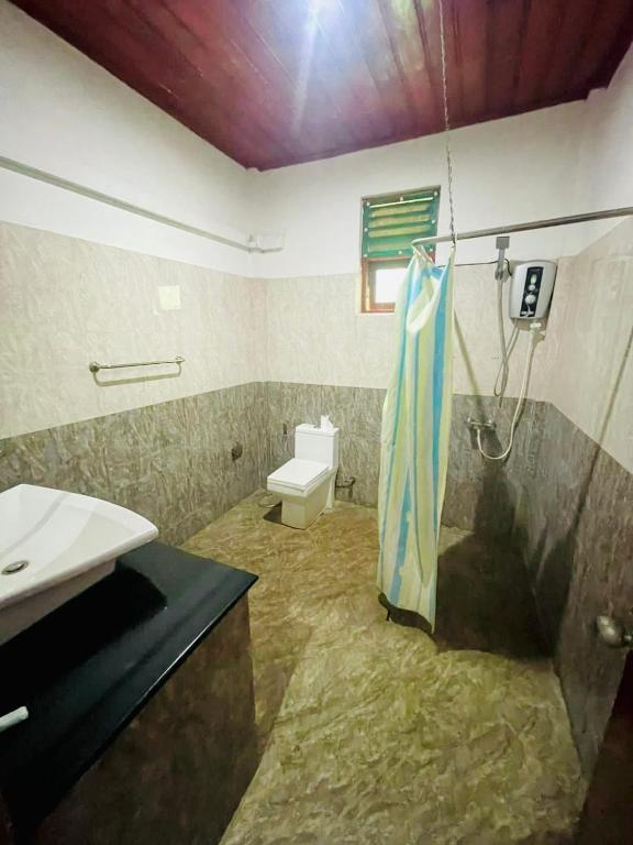 Koupelna v ubytování Hotel Sanda Diya - Dambulla