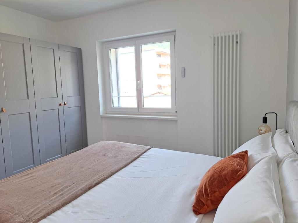 Letto o letti in una camera di Urban Residence by Quokka 360 - Modern apartments in Lugano