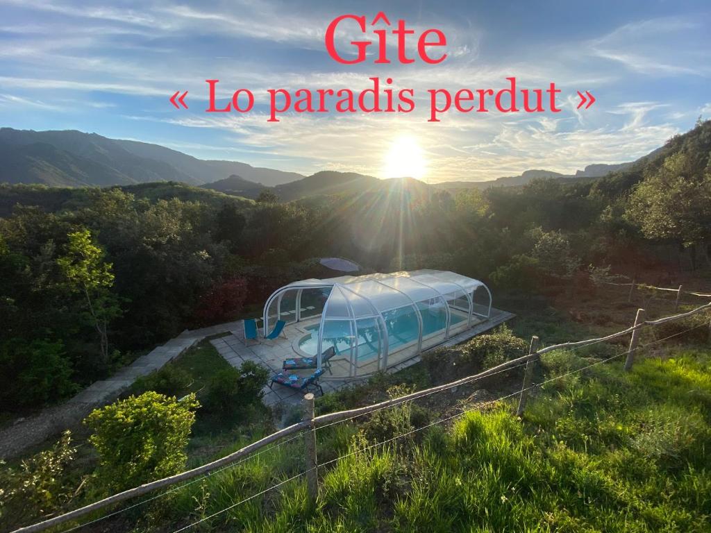 a luxury tent in the middle of a valley with the sunset at Appart 70m2 avec piscine in Saint-Geniès-de-Varensal