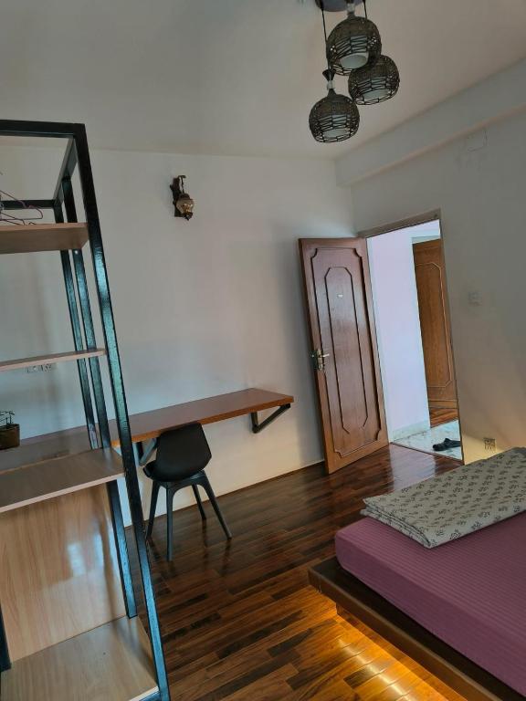 Postel nebo postele na pokoji v ubytování Peakman Residence