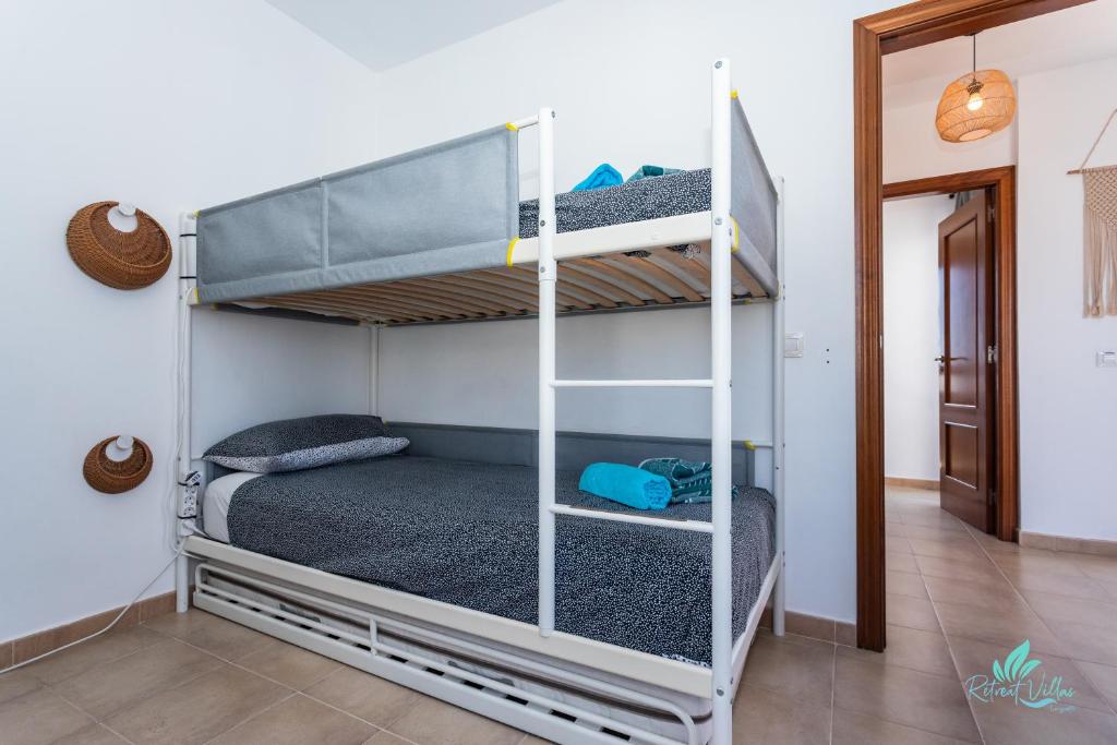 Postel nebo postele na pokoji v ubytování Villa Oliral