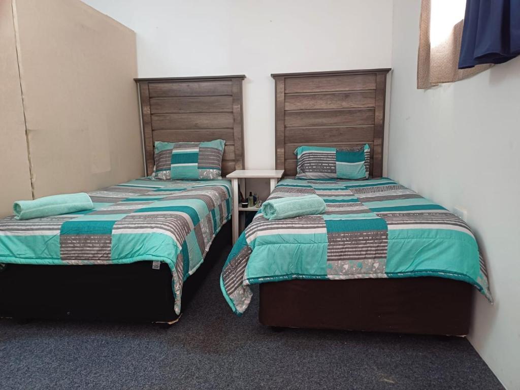 Postel nebo postele na pokoji v ubytování Platinum Loft