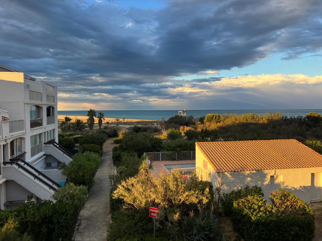 a view of the ocean from a building at Le Panorama du Tropique Saint Cyprien - Saint-Cyprien-Plage - Perpignan 66 Vue mer - Front de mer in Saint-Cyprien