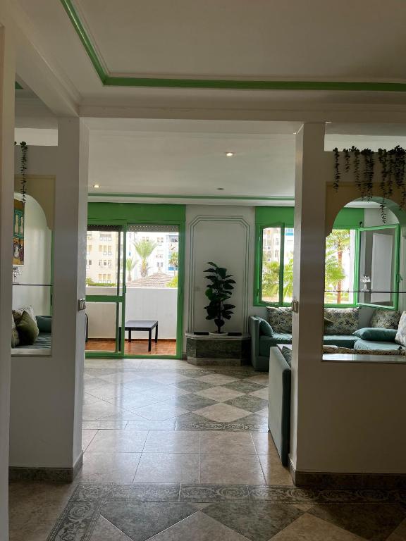 Posezení v ubytování Luxueux appartement avec vue mer & piscine