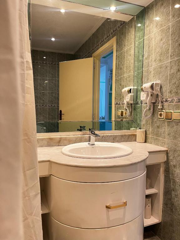 Koupelna v ubytování Luxueux appartement avec vue mer & piscine