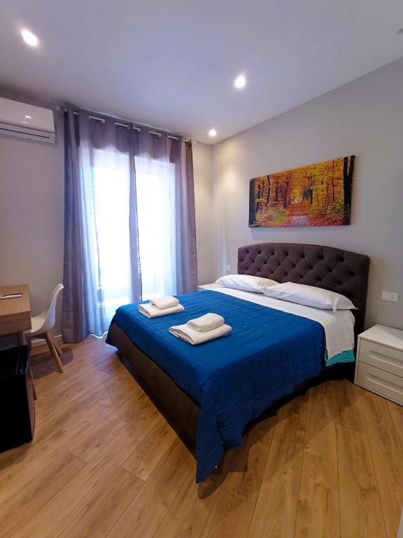 Postel nebo postele na pokoji v ubytování Angel rooms