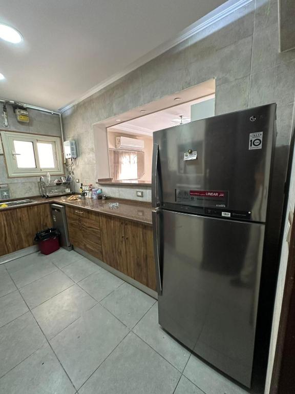 Kuchyň nebo kuchyňský kout v ubytování Airport Edge Suite