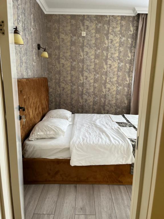 Postel nebo postele na pokoji v ubytování Hotel Sunny Days Borjomi