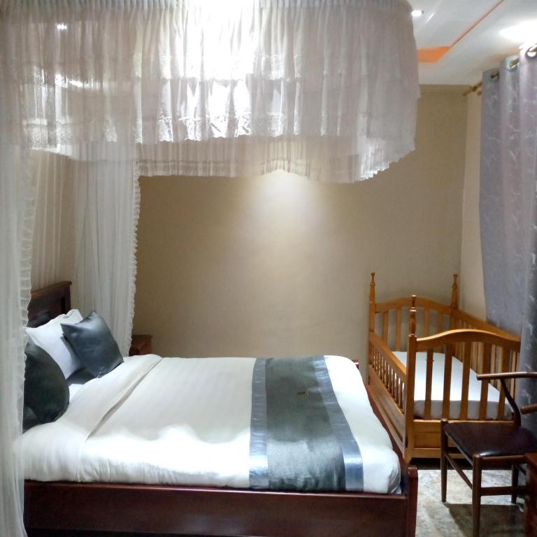 Postel nebo postele na pokoji v ubytování HOTEL ZEPTAN