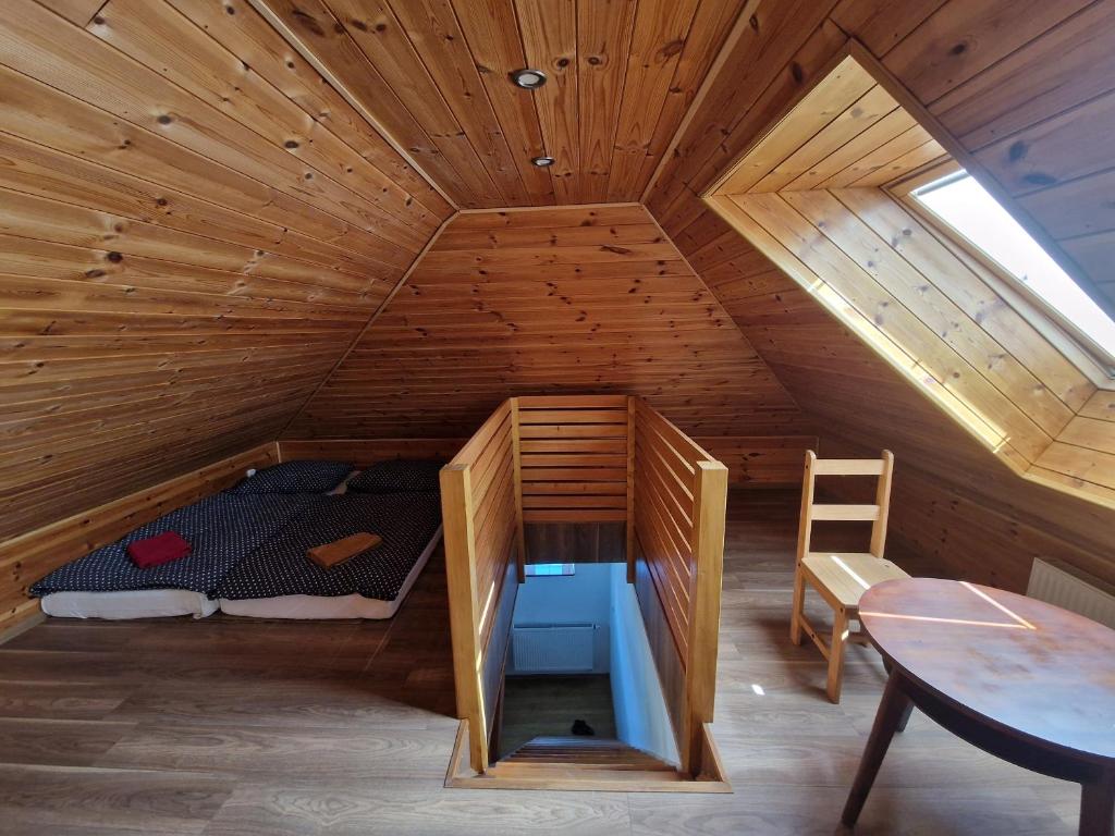 Postel nebo postele na pokoji v ubytování Apartmány Na rychtě