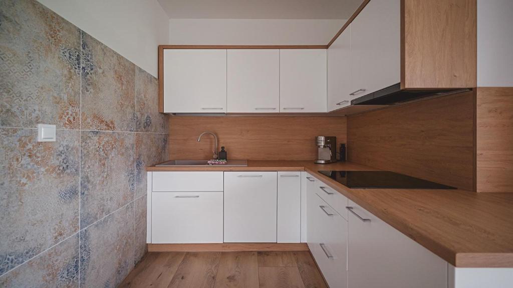 Kuchyň nebo kuchyňský kout v ubytování Apartamenty Sun & Snow Kaniówka