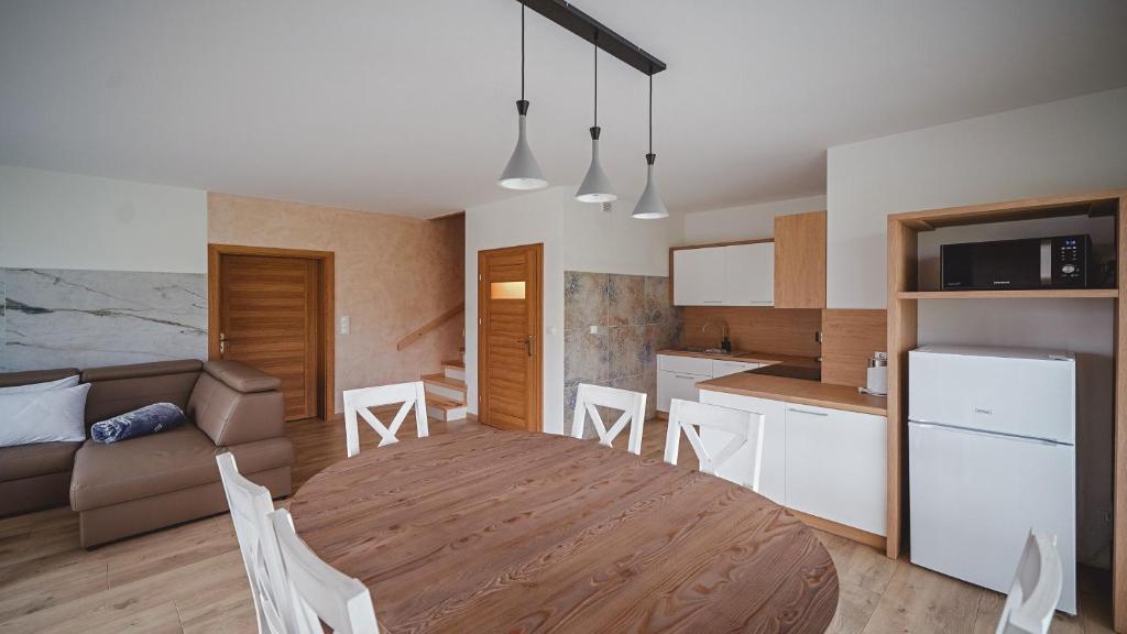 Kuchyň nebo kuchyňský kout v ubytování Apartamenty Sun & Snow Kaniówka