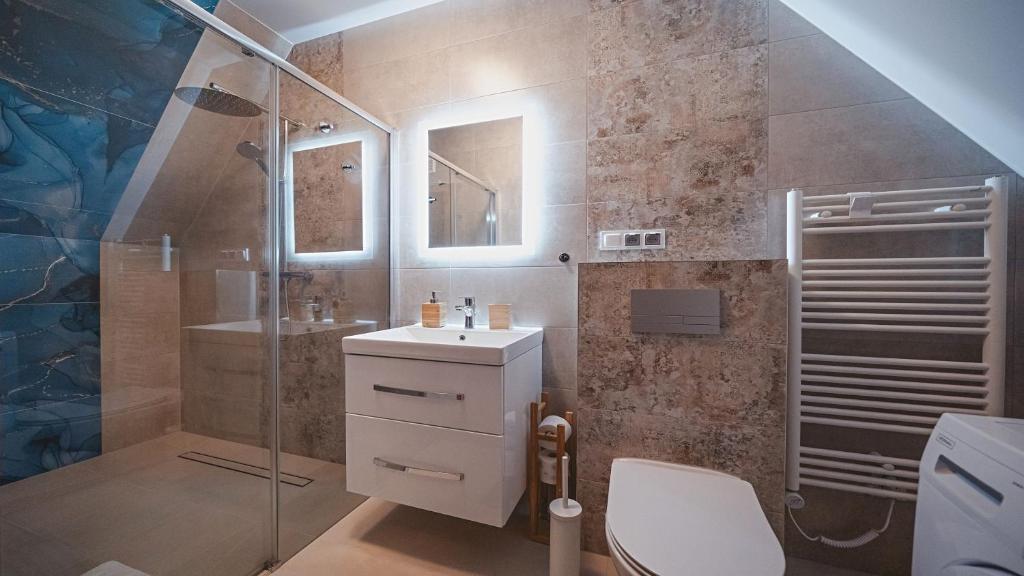 Koupelna v ubytování Apartamenty Sun & Snow Kaniówka