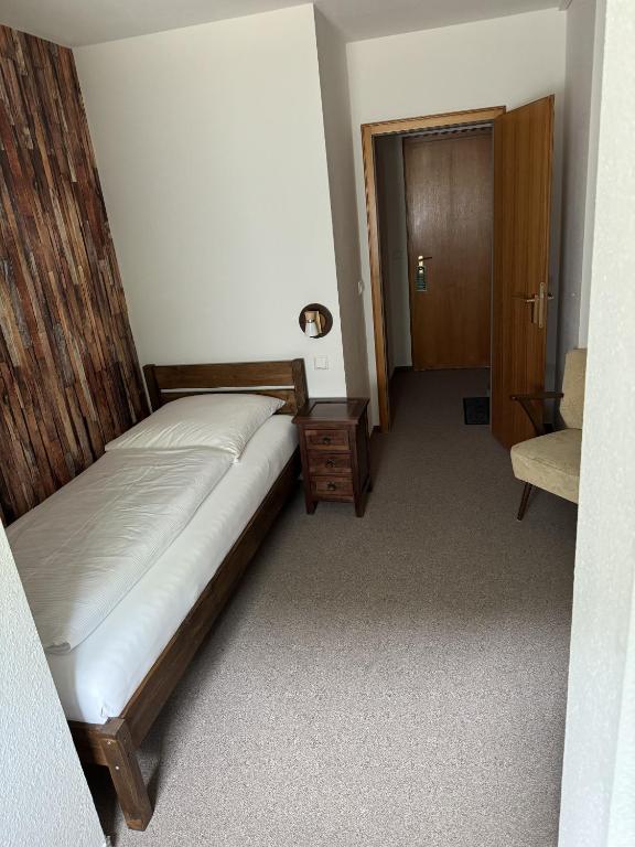 Postel nebo postele na pokoji v ubytování Hotel Silberfelsen