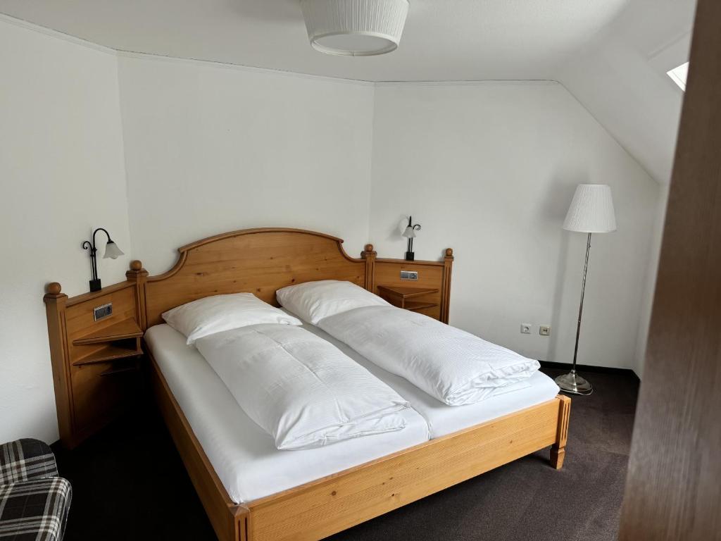 Postel nebo postele na pokoji v ubytování Hotel Silberfelsen