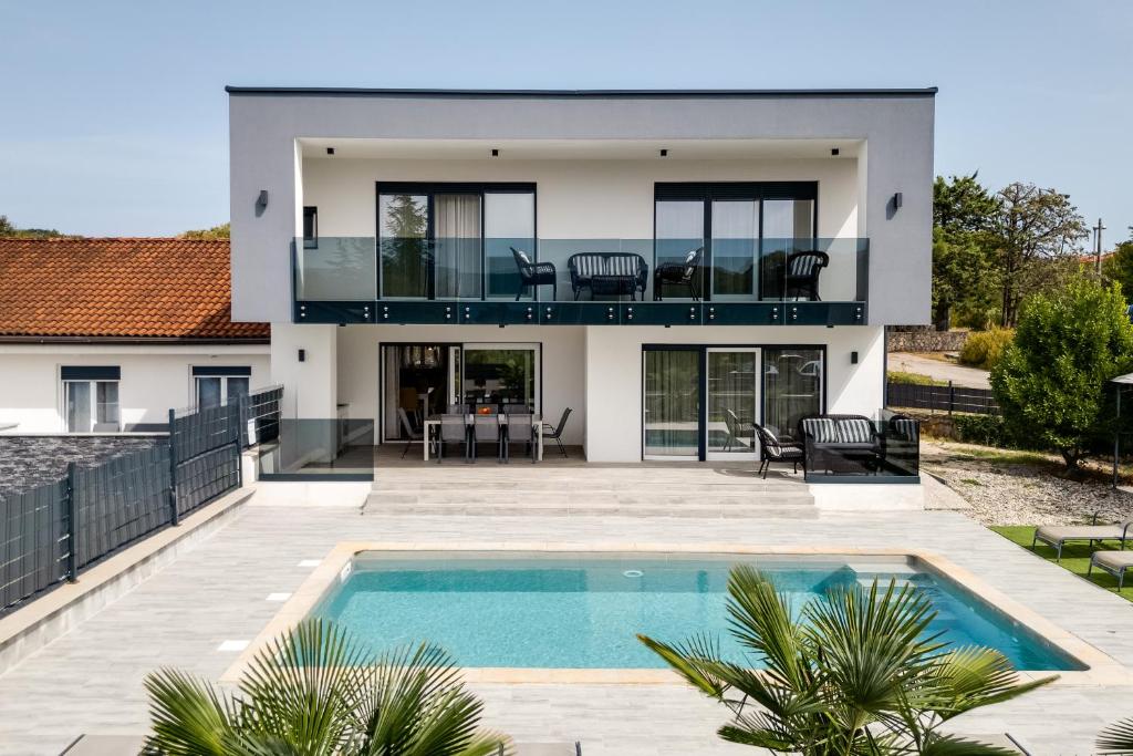 Beautiful new villa with a pool near beach - by TRAVELER tourist agency Krk ID 2410