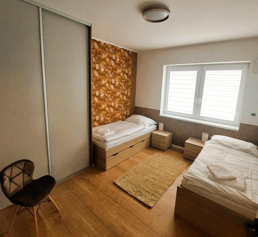 Postel nebo postele na pokoji v ubytování Three Diamonds Residence